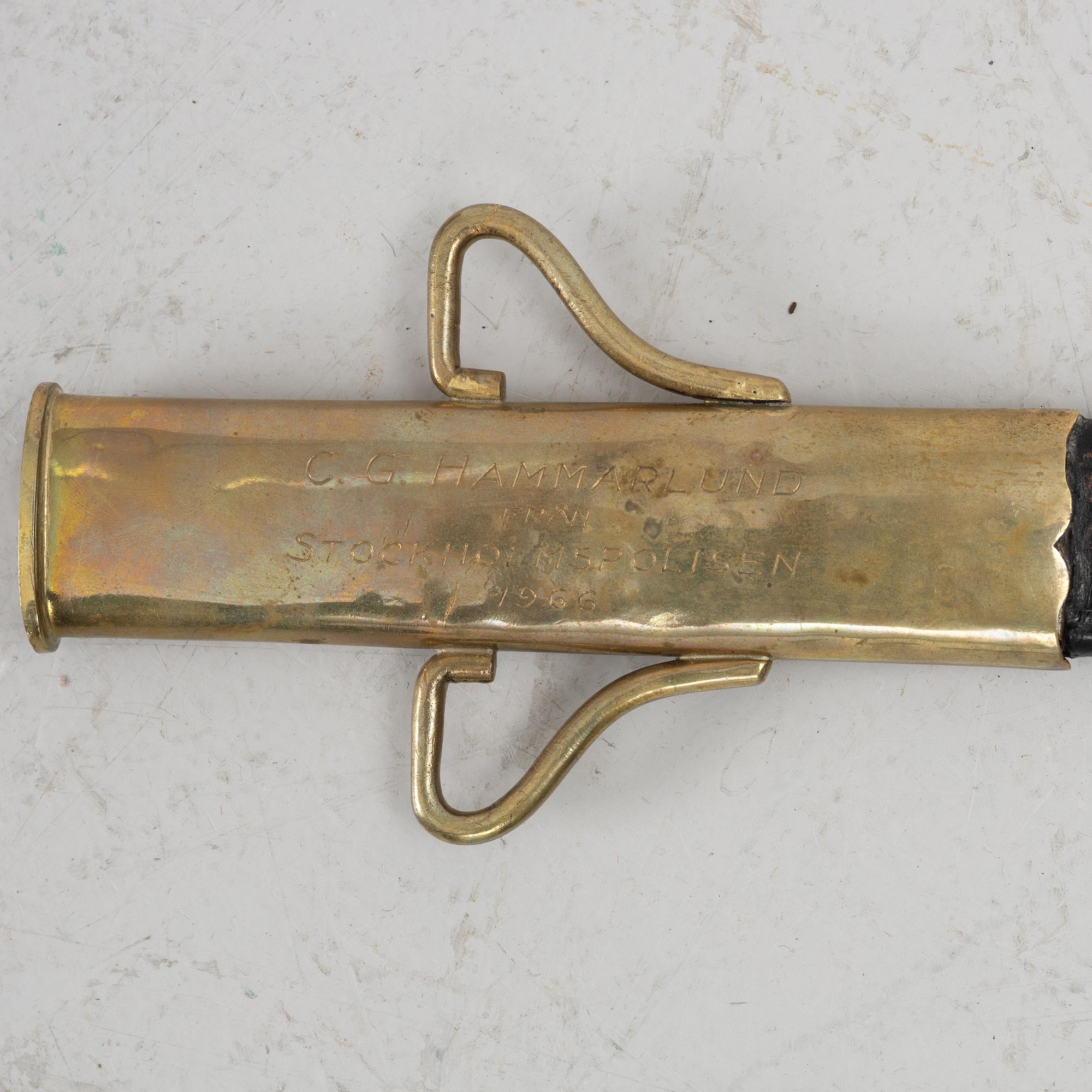 Polissabel, 1900-talets början, med balja.