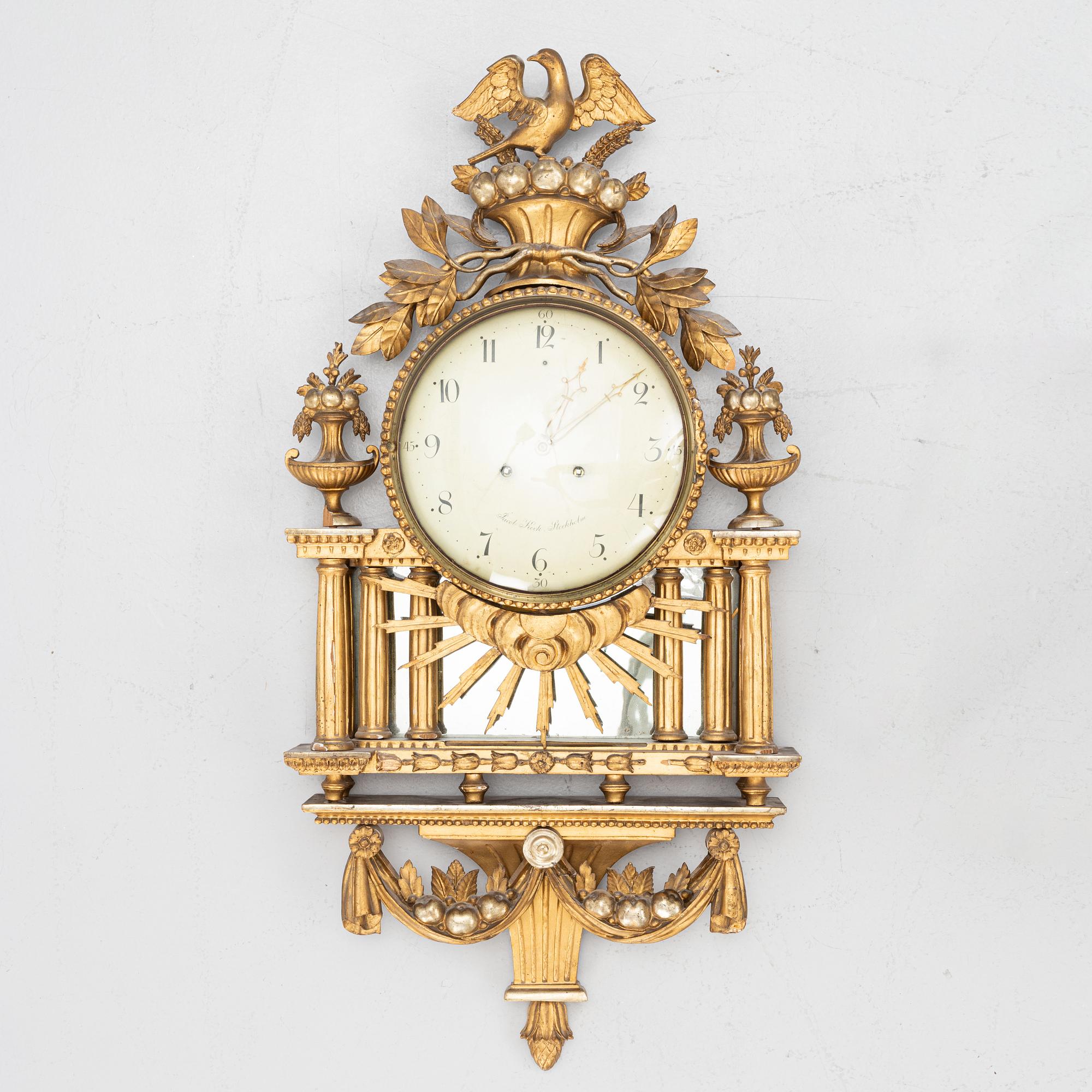 A Gustavian wall clock signed by Jacob Koch (active in Stockholm, 1762-1805).