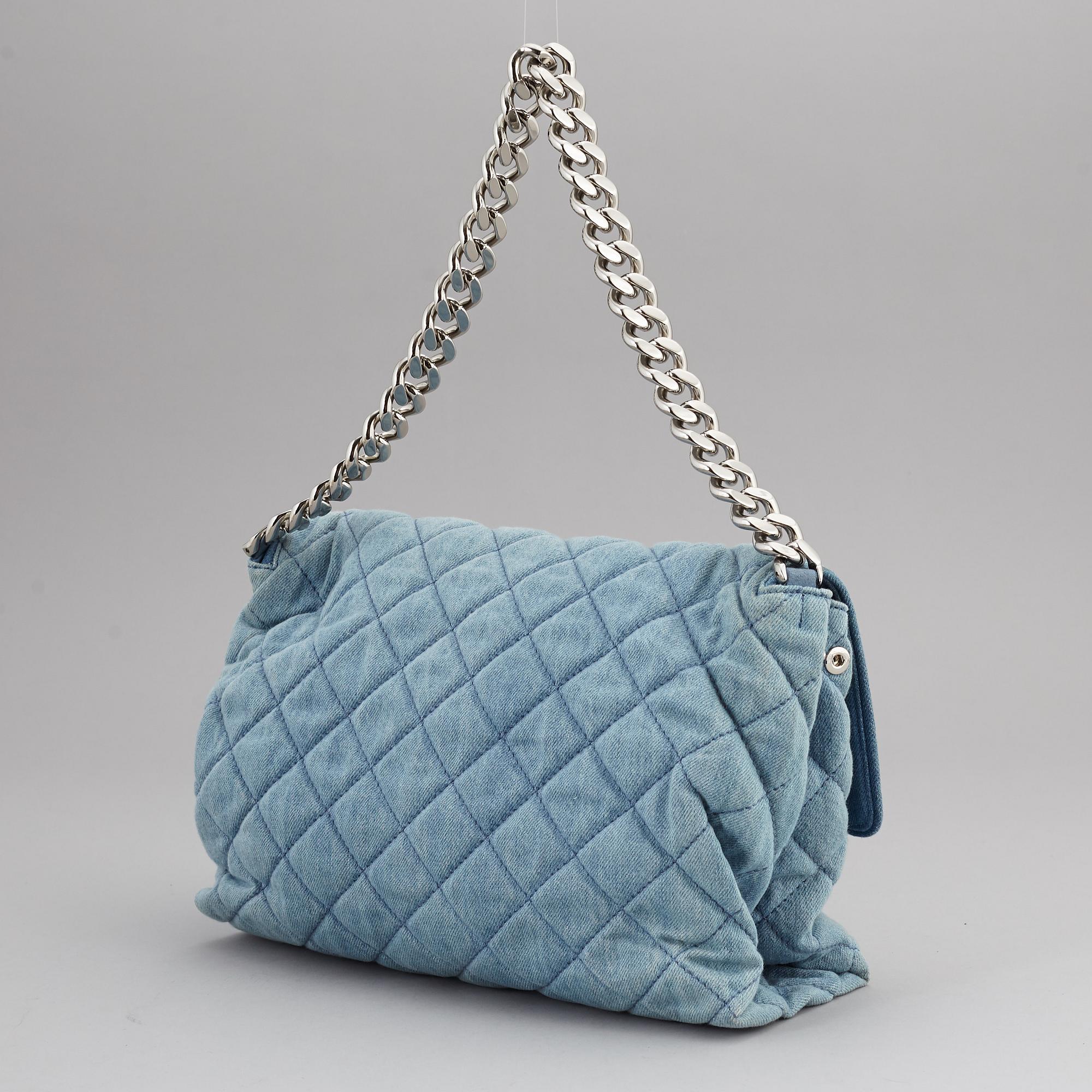 STELLA MCCARTNEY, a denim handbag.