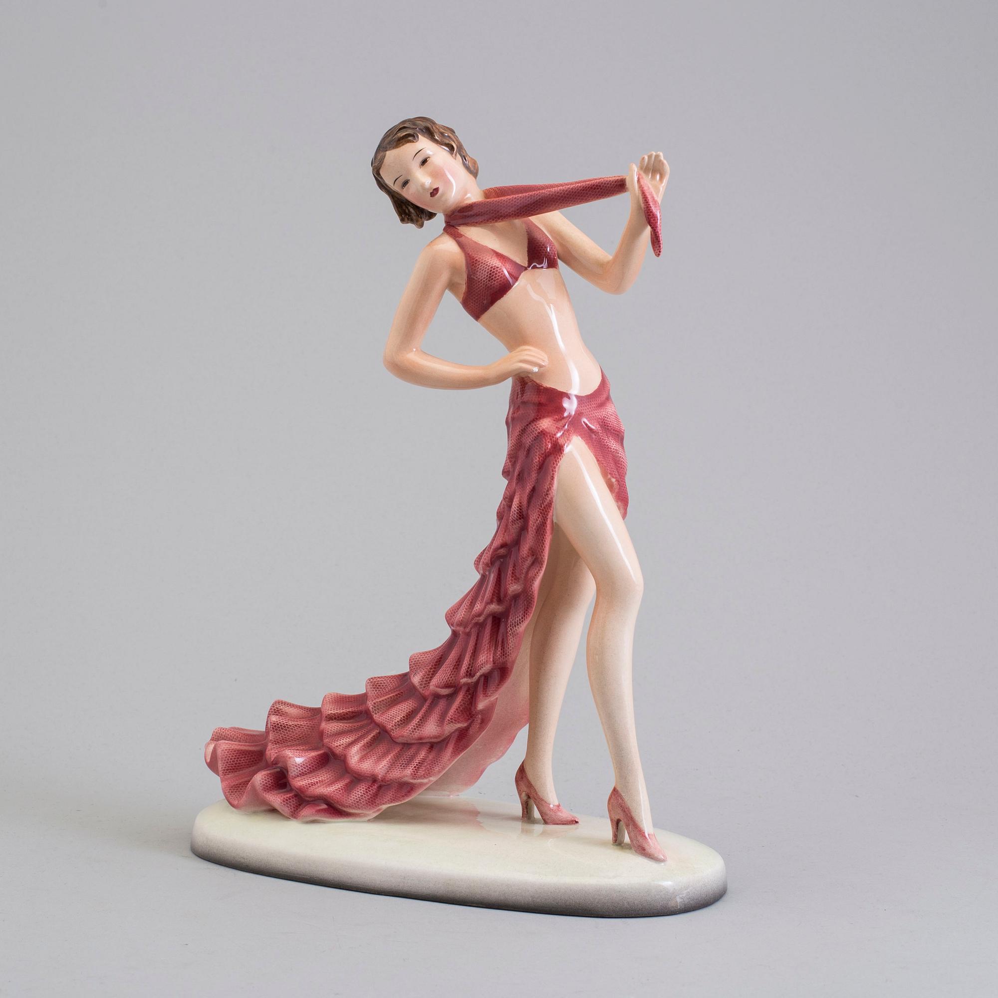 a creamware figurine by Stefan Dakon, Goldscheider, 1938.