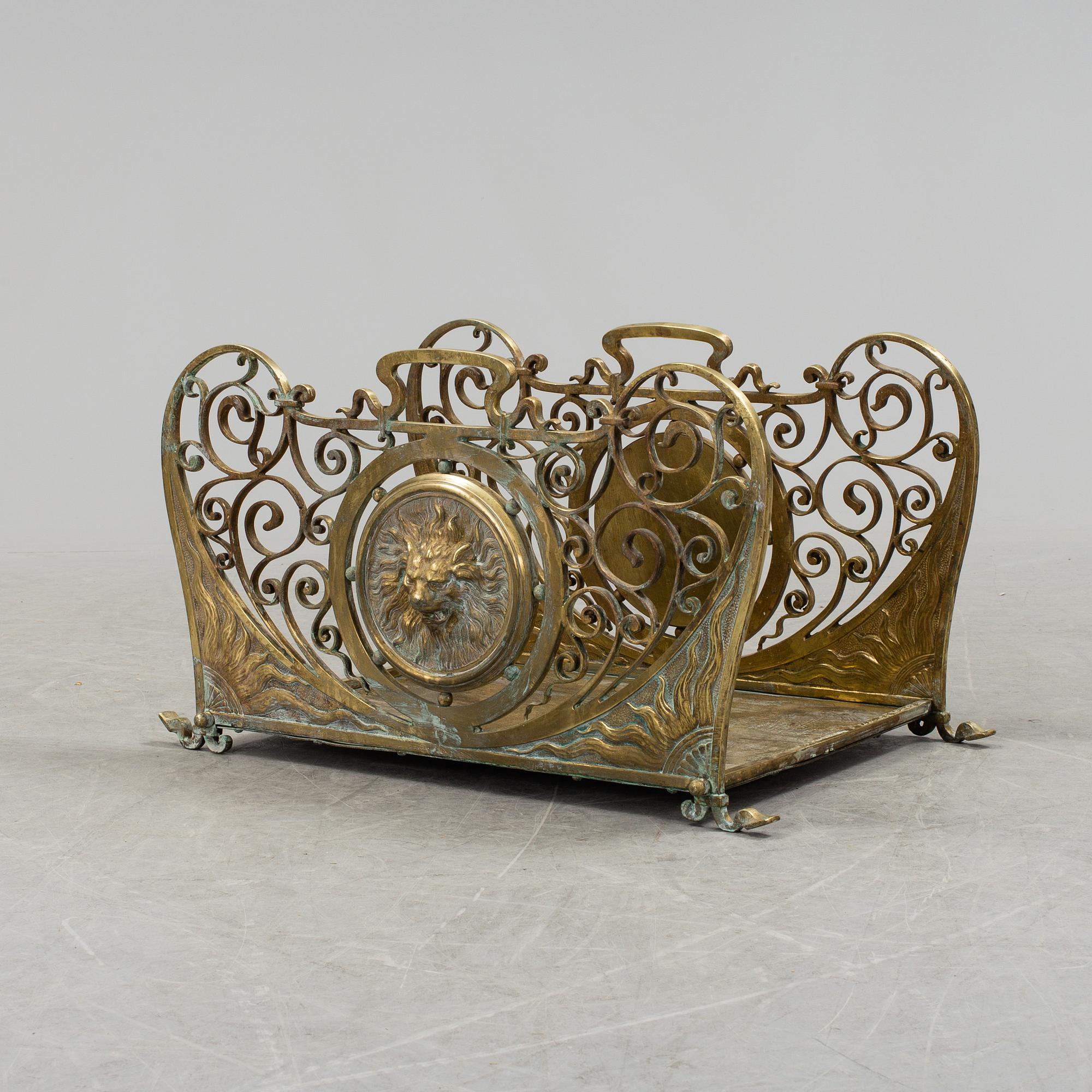 A French late 19th century brass firewood rack / fireplace log holder.