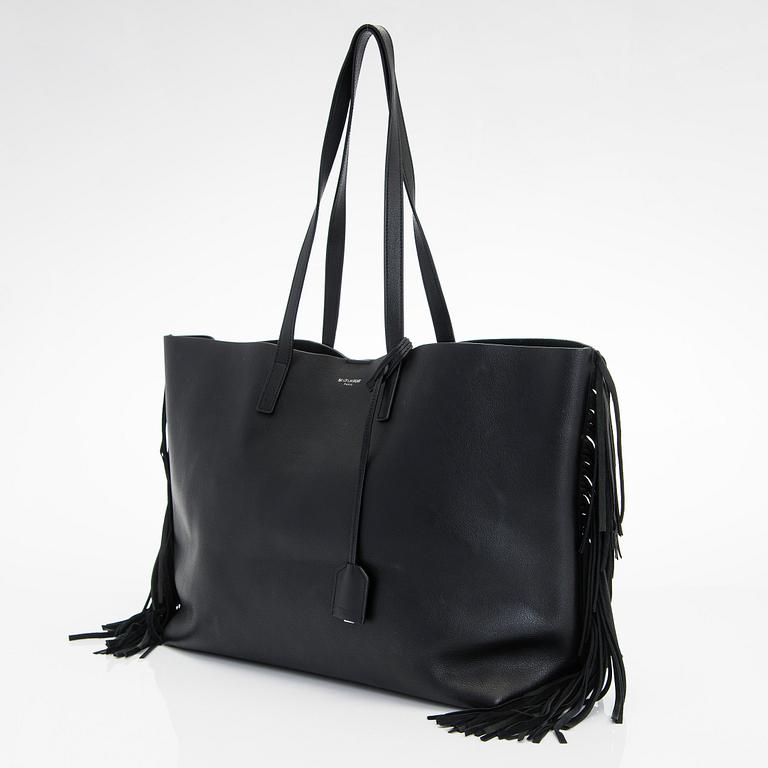 Saint Laurent, a 'Sac shopping' bag.