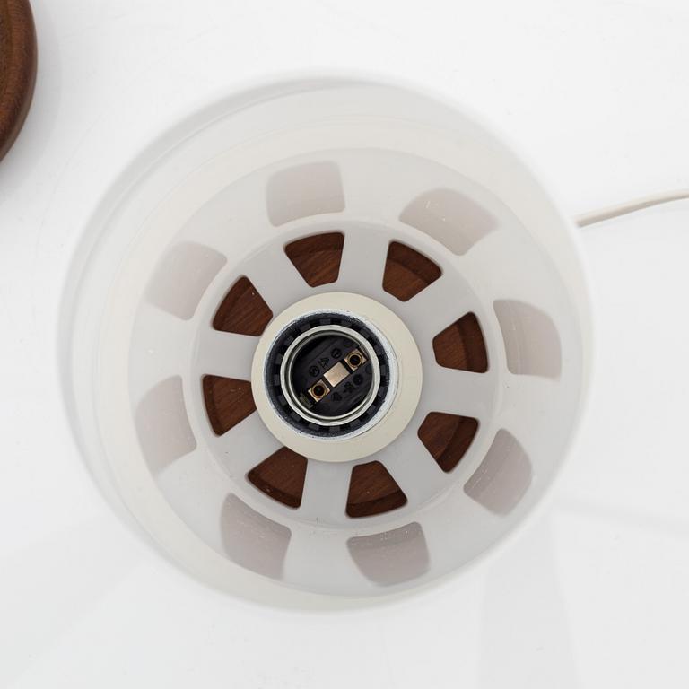 Uno & Östen Kristiansson, a pair of teak and acrylic table lights, Luxus, Vittsjö.