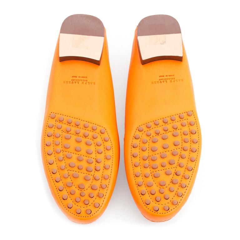 RALPH LAUREN, a pair of orange leather loafers. Size US 8 1/2B.