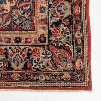 A semi-antique Sarouk carpet, c 275 x 185 cm.