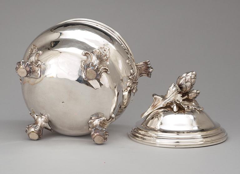 A Louis XV 1740's silvered brass/argent haché tureen with cover stamped with C couronné.