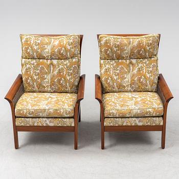 Arne Norell, a pair of 'Rotang' easy chairs, Norell Möbel AB, Sweden.