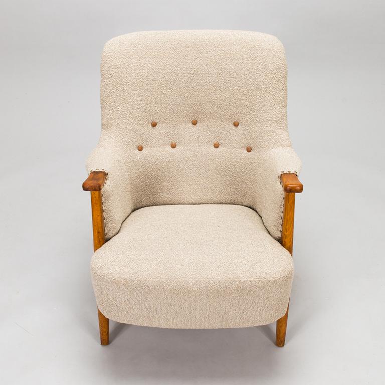 Olof Ottelin, a 1950's 'Pompadour' armchair for Oy Stockmann Ab, Keravan puusepäntehdas.