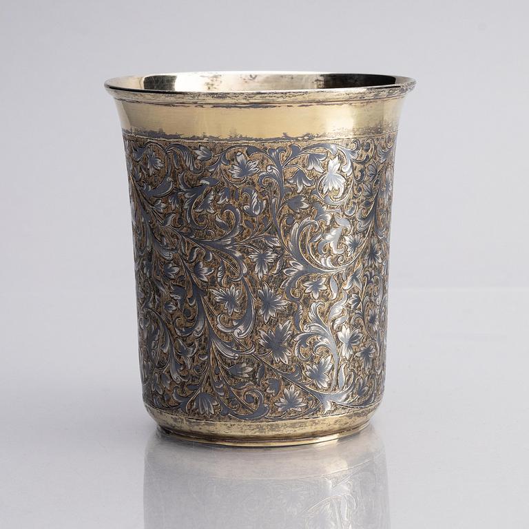 A Russian silver-gilt beaker with niello, unidentified maker A.K., assay master Michael Chumazov, Moscow 1846.