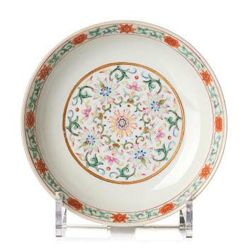 829. A yellow-ground famille rose 'lotus' dish, Qing dynasty, Jiaqing red seal mark and of the period (1796-1820).