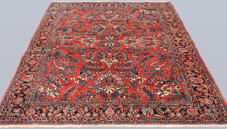 A semi-antique rug, so called American Sarouk, approx. 200 x 140 cm.