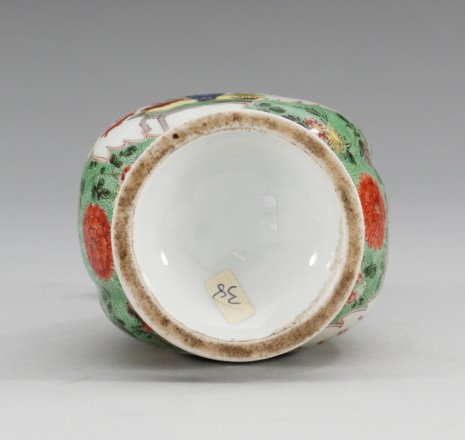 A famille verte oil and vinegar ewer, Qing dynasty (1644-1912).