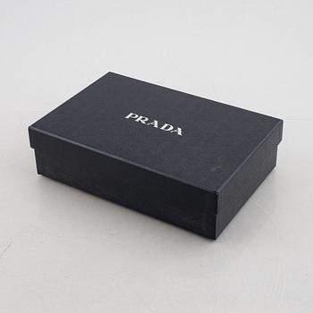 Prada, clutch.