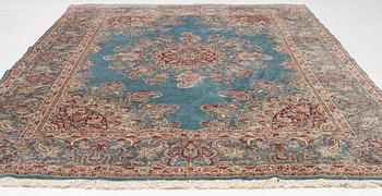 A Kirman carpet, c. 335 x 232 cm.