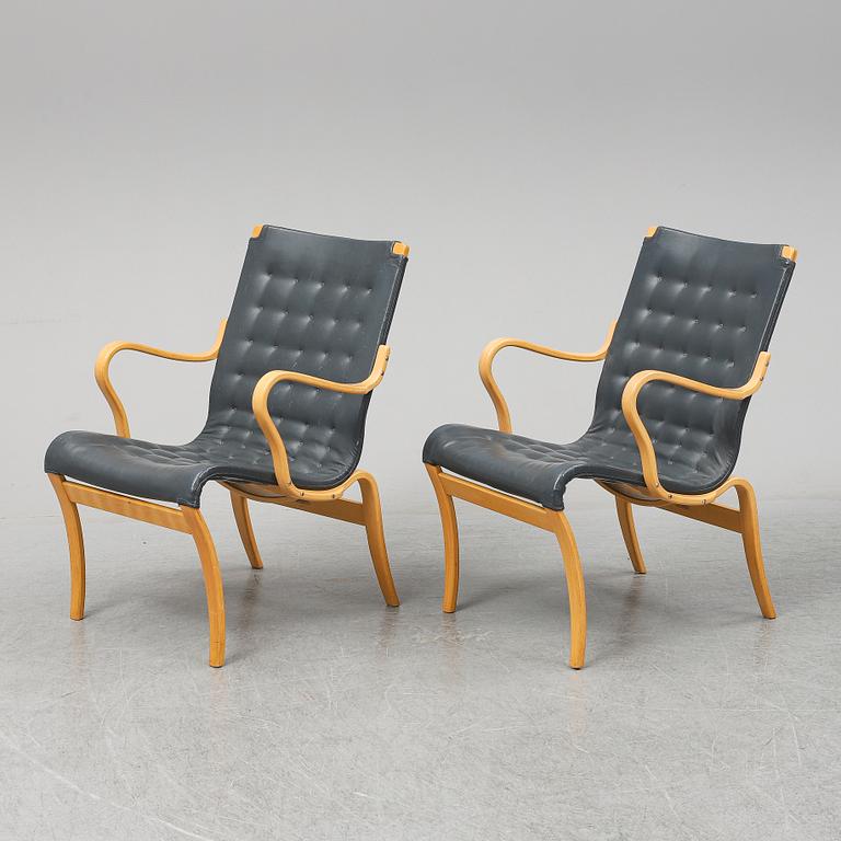 A second half of the 20th Century pair of 'Mina' armchairis by Bruno Mathsson for Mathsson International.
