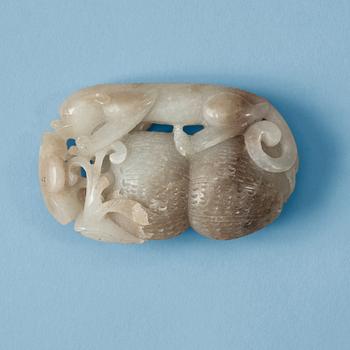 A carved nephrite figure, China.