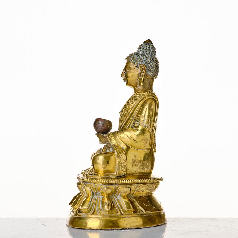 A seated bronze figure of amithaba Buddha, Tibeto-chinese, 18th Century.