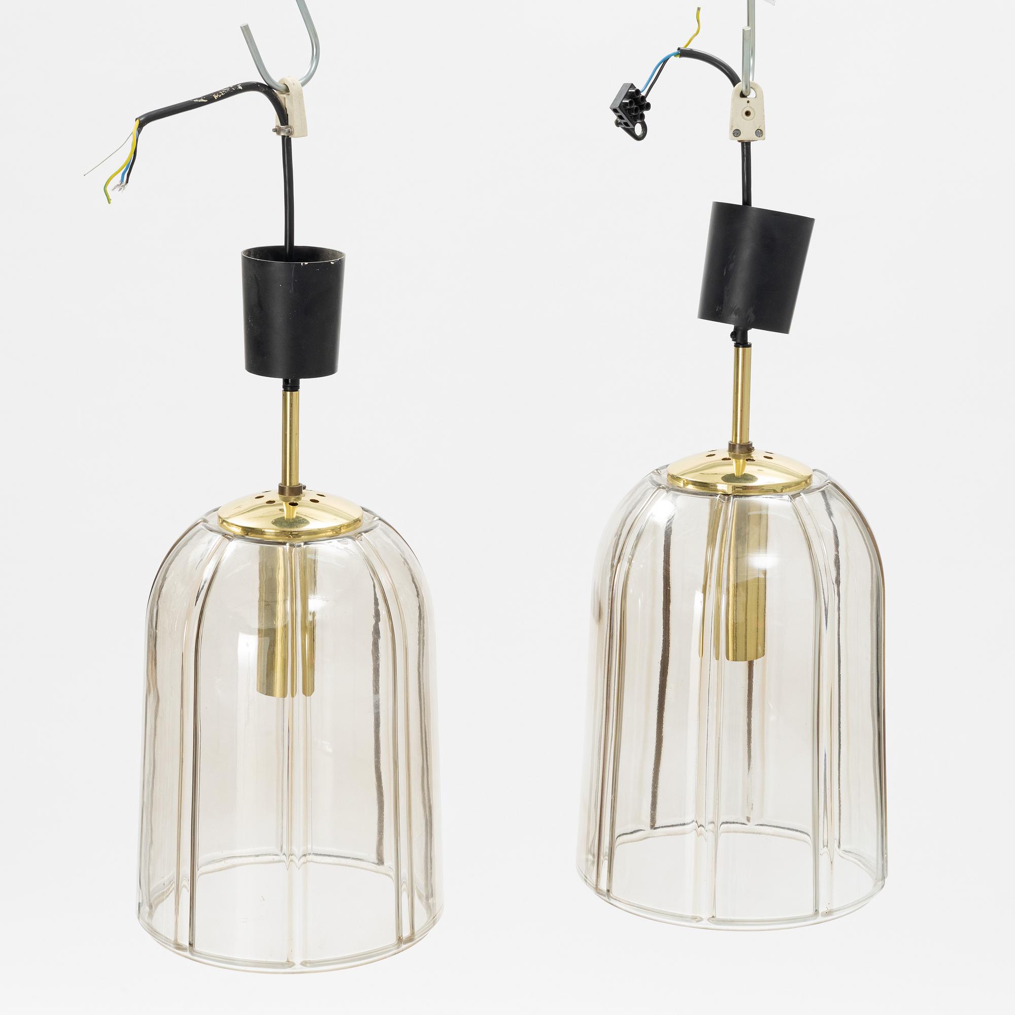 A pair of glass and brass ceiling lights, Glashütte Limburg, Germany.