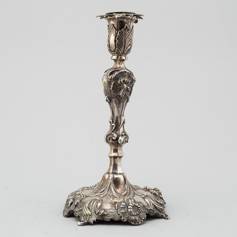 GUSTAF MÖLLENBORG, a silver candlestick dated 1853.