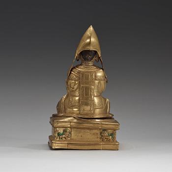 A Mongolian repousse gilt copper figure of Tsong Kapa, 18th Century.