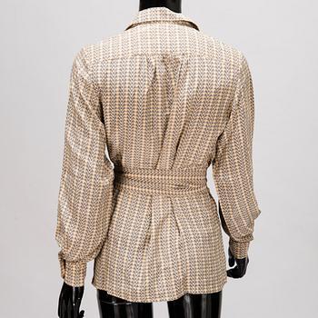 GUCCI Silk Blouse and a Leather Belt.