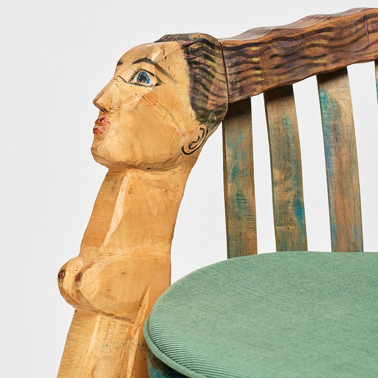 Gérard Rigot, a sculptured and signed armchair, late 20th century.