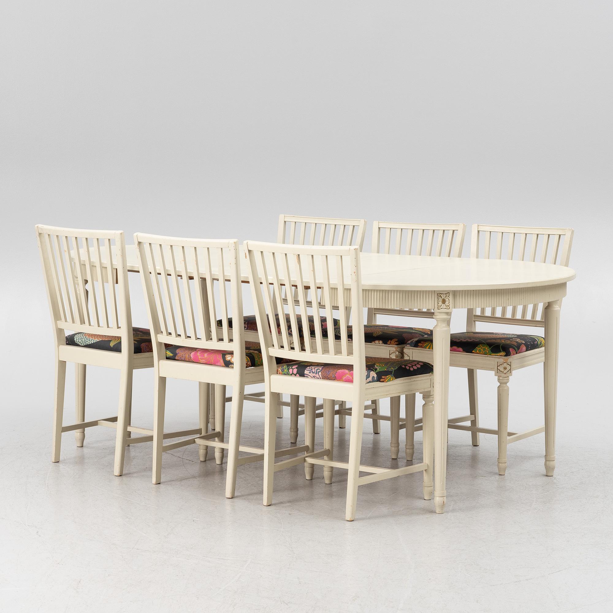 Dining table with six chairs, Gustavian style, second half of the 20th Century.