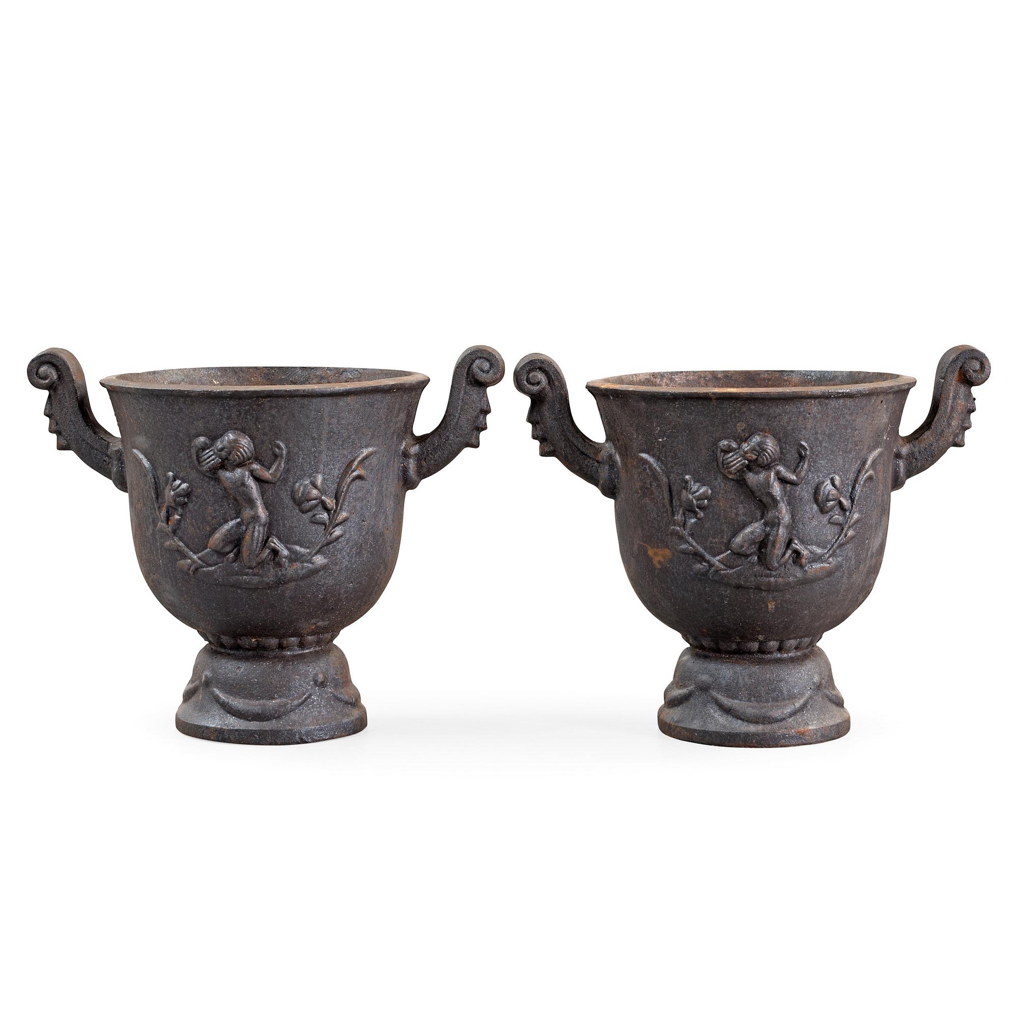 A pair of Ivar Johnsson 'Faun' cast iron jardinières, Näfveqvarn, Sweden.