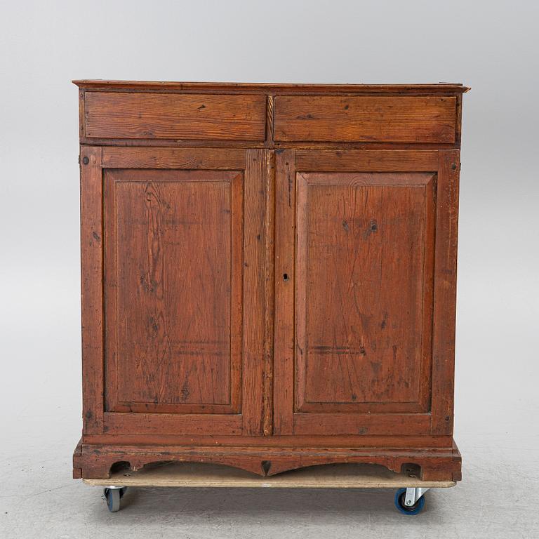A 19th century cabinet.