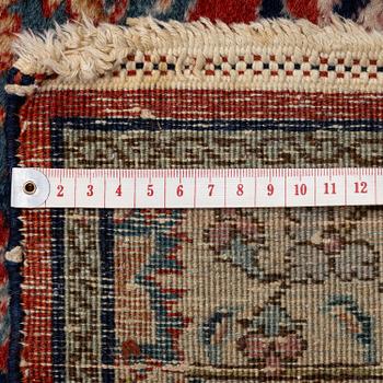 A semi-antique Benlian Tabriz carpet of 'Coronation' design, signed Jabarzade, c. 488 x 367 cm.