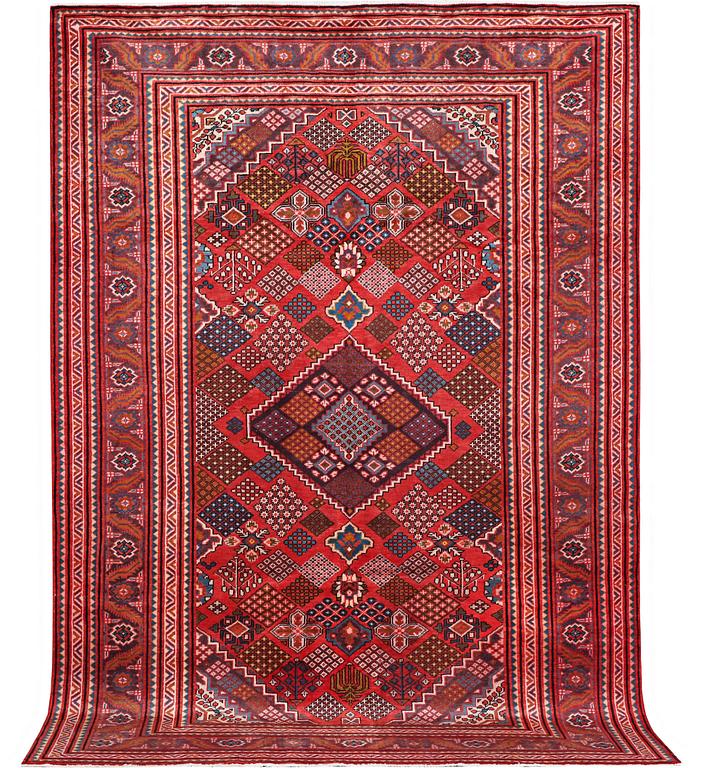 A carpet, Mahabad, c. 308 x 208 cm.