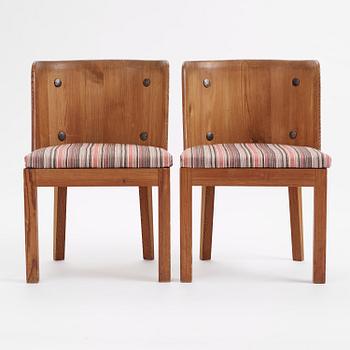 Axel Einar Hjorth, a pair of stained pine "Lovö" armchairs, Nordiska Kompaniet,  Sweden, 1930s.