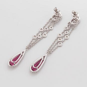 A pair of rubellite and brilliant- and rose- cut diamond earrings.