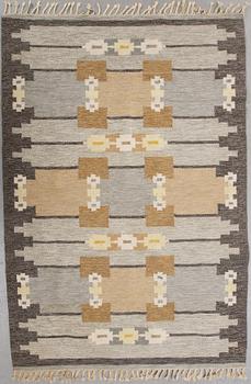A signed flat weave carpet 220x160 cm.
