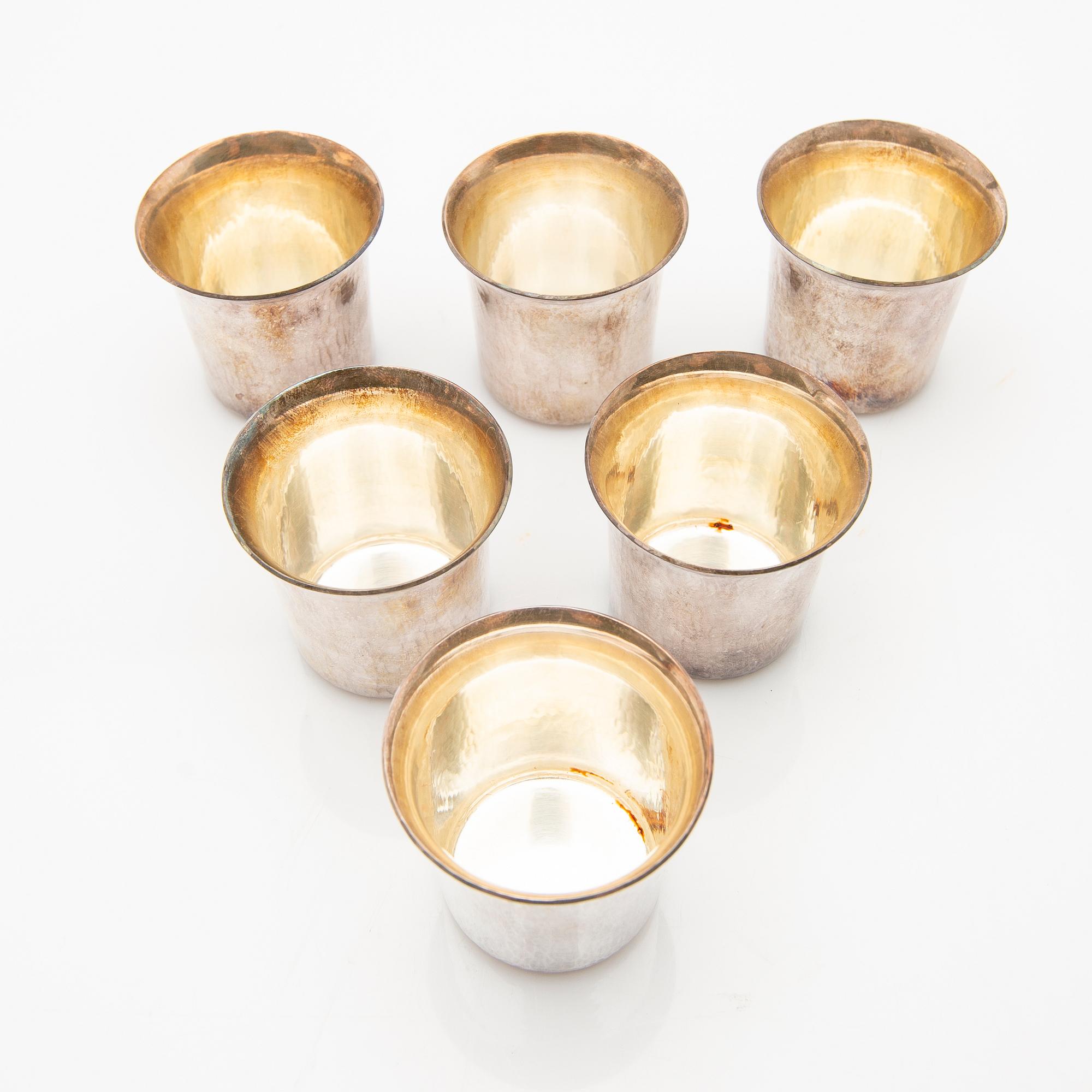 Cup and saucer set, 7 pieces, sterling silver, Einar Telander, Stockholm 1976-79.