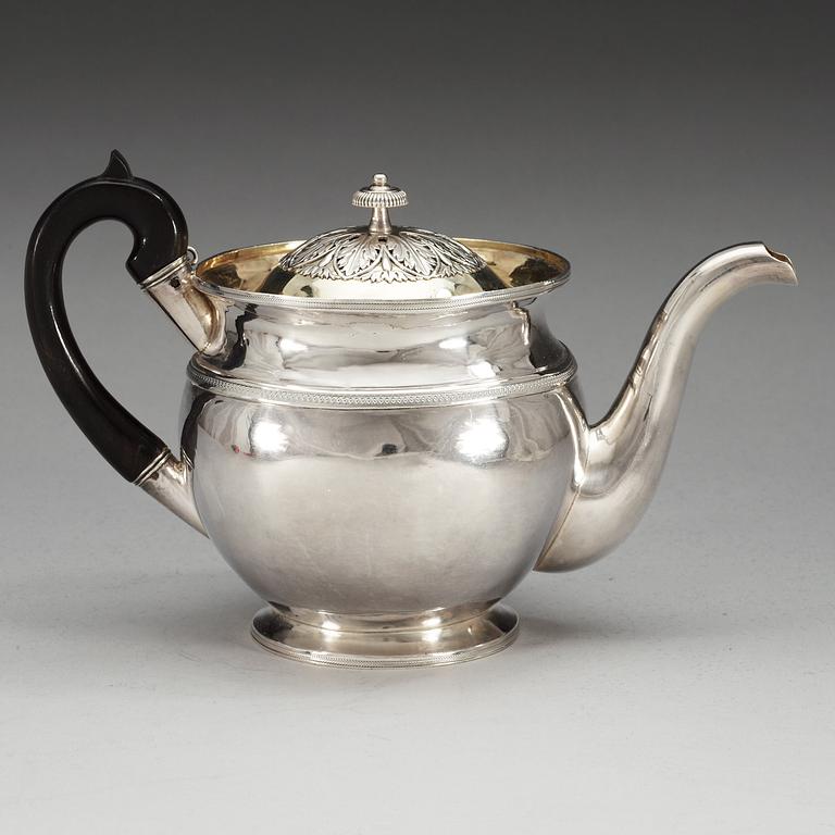 A Russian 20th century parcel-gilt tea-pot, un identified makers mark, S.t Petersburg.
