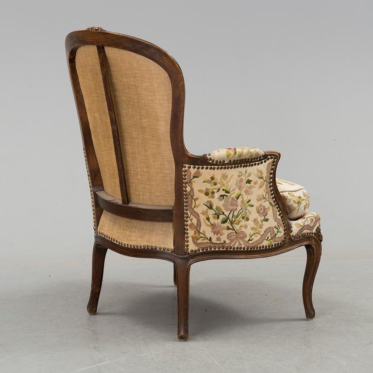 An end of the 19th century Louis XV style oak bergere.