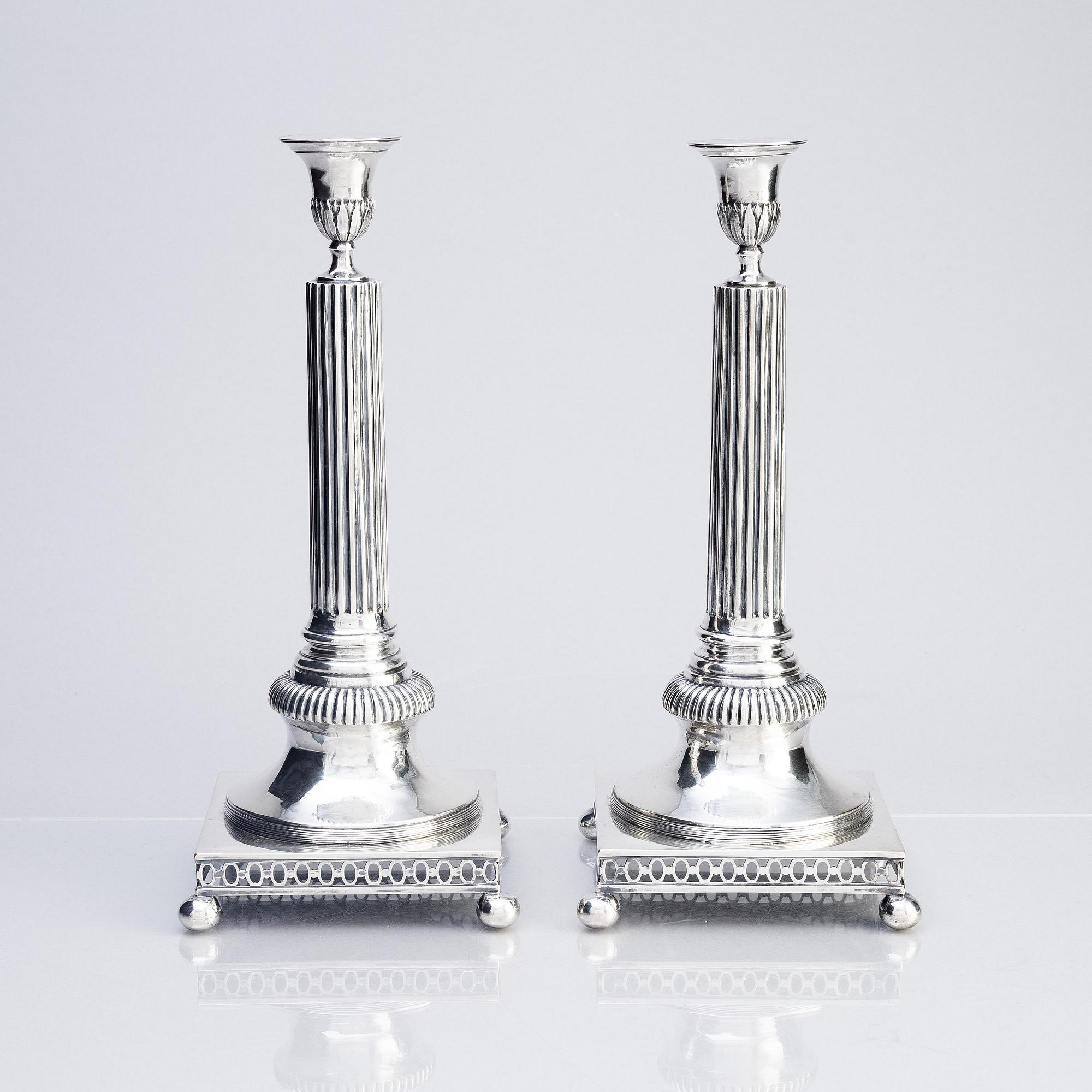 A pair of Swedish 18th century Gustavian silver candlesticks, mark of Arvid Floberg, Stockholm 1798.