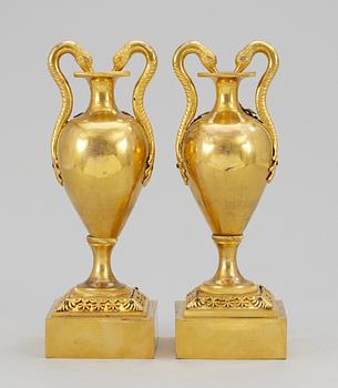 Two matched 19th century table urns.