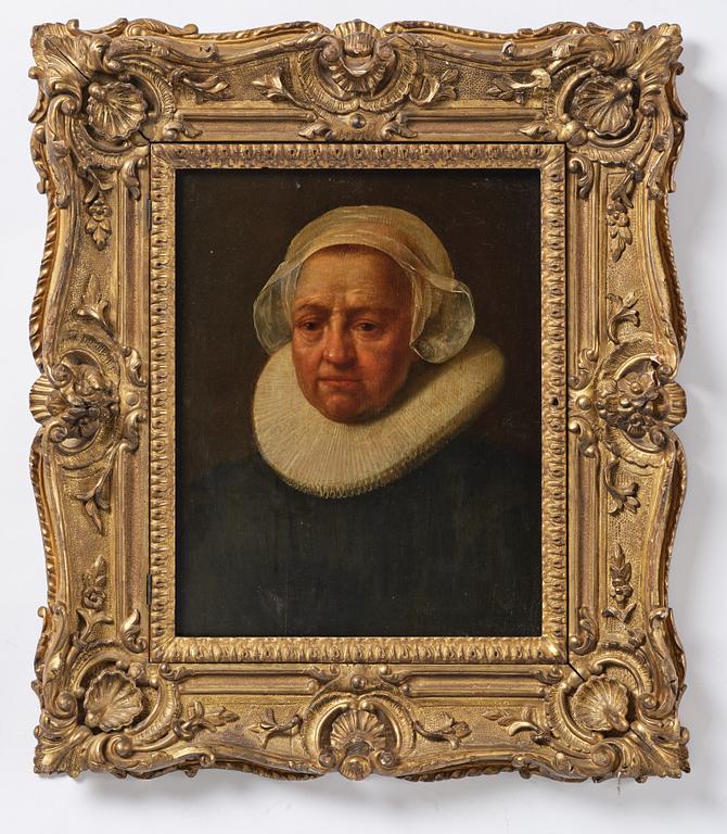 Rembrandt Harmensz van Rijn, follower of, Portrait of an older woman.