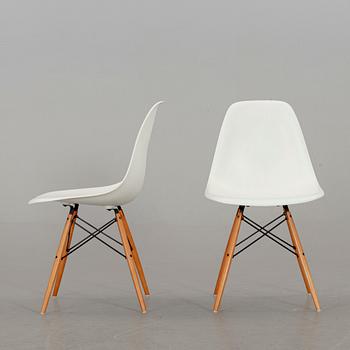 A PAIR OF "PLASTIC CHAIR" BY CHARLES & RAY EAMES, Vitra 2009.