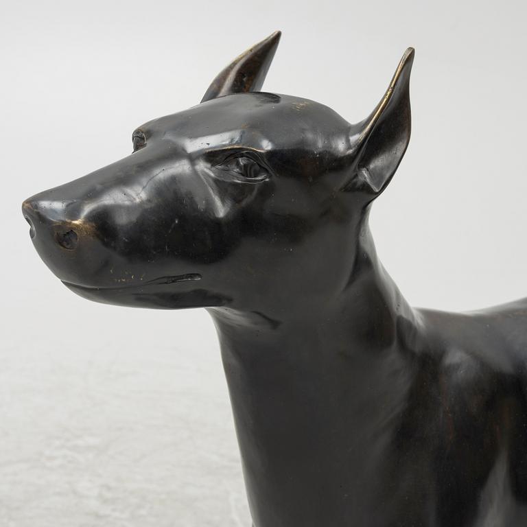 A decorative sculpture of a dog, 20th/21st century.