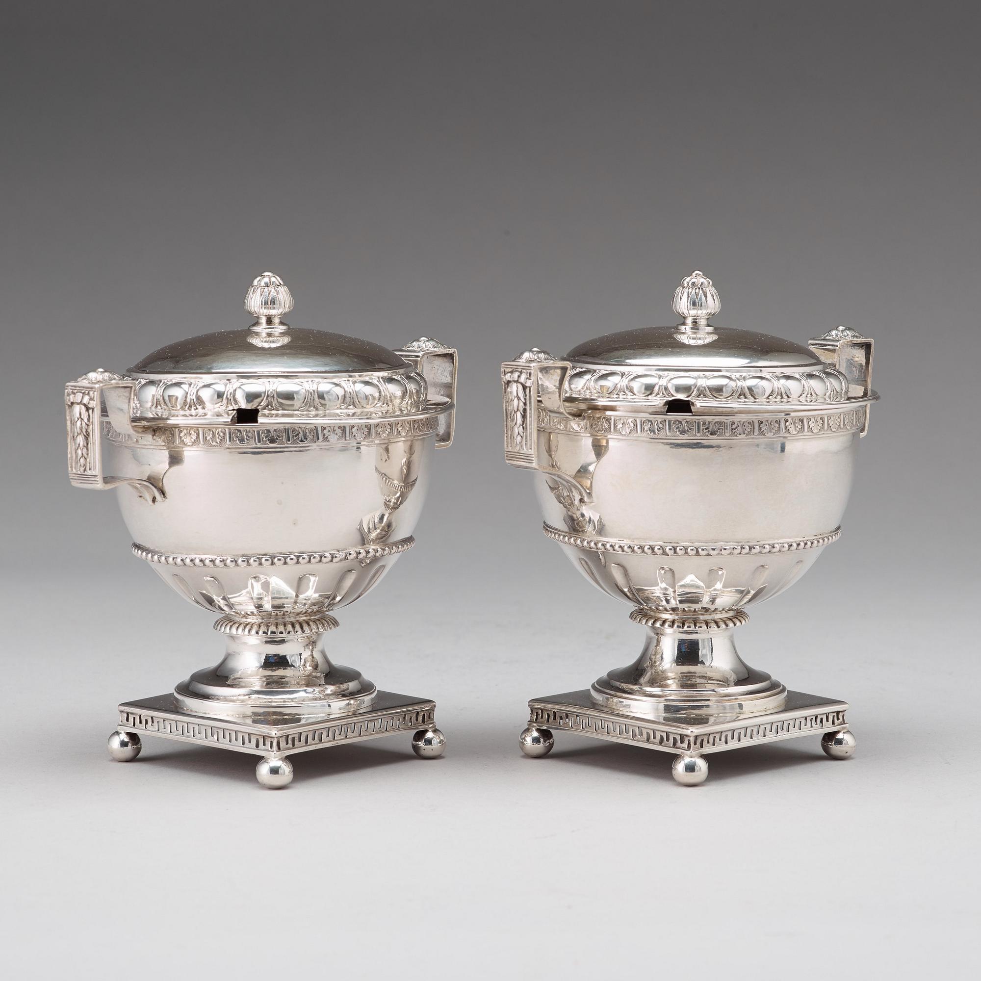 A pair of Swedish late 18th century silver sugar bowls and covers, mark of Pehr Zethelius, Stockholm 1780 and 1781.