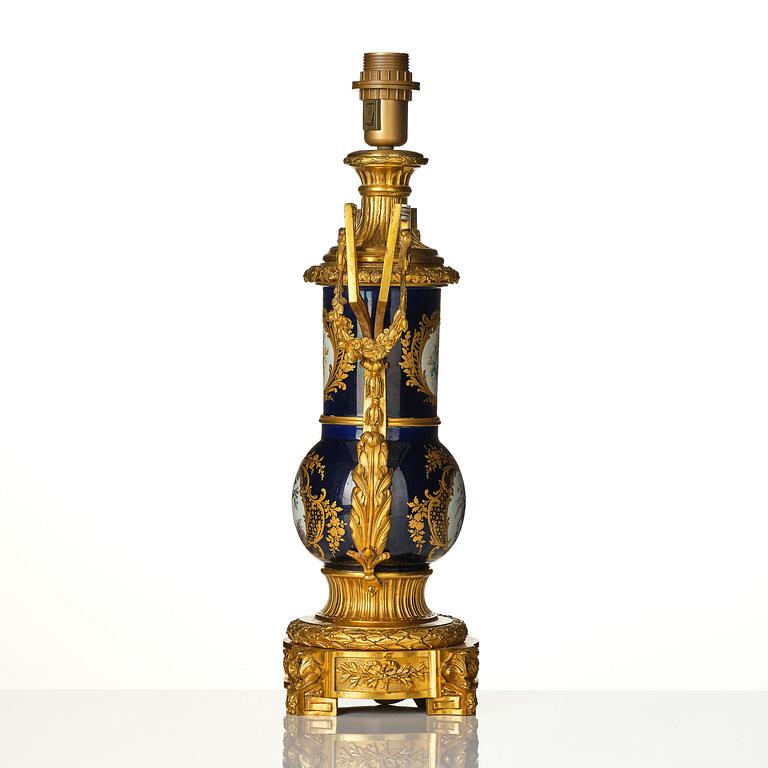 A 'Sèvres' gilt bronze table lamp, France, circa 1900.