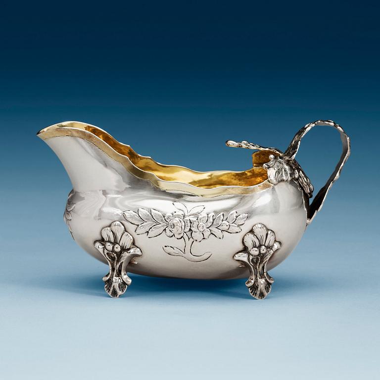 A Swedish 18th century parcel-gilt cream-jug, marks of Anders Schotte, Uddevalla 1784.