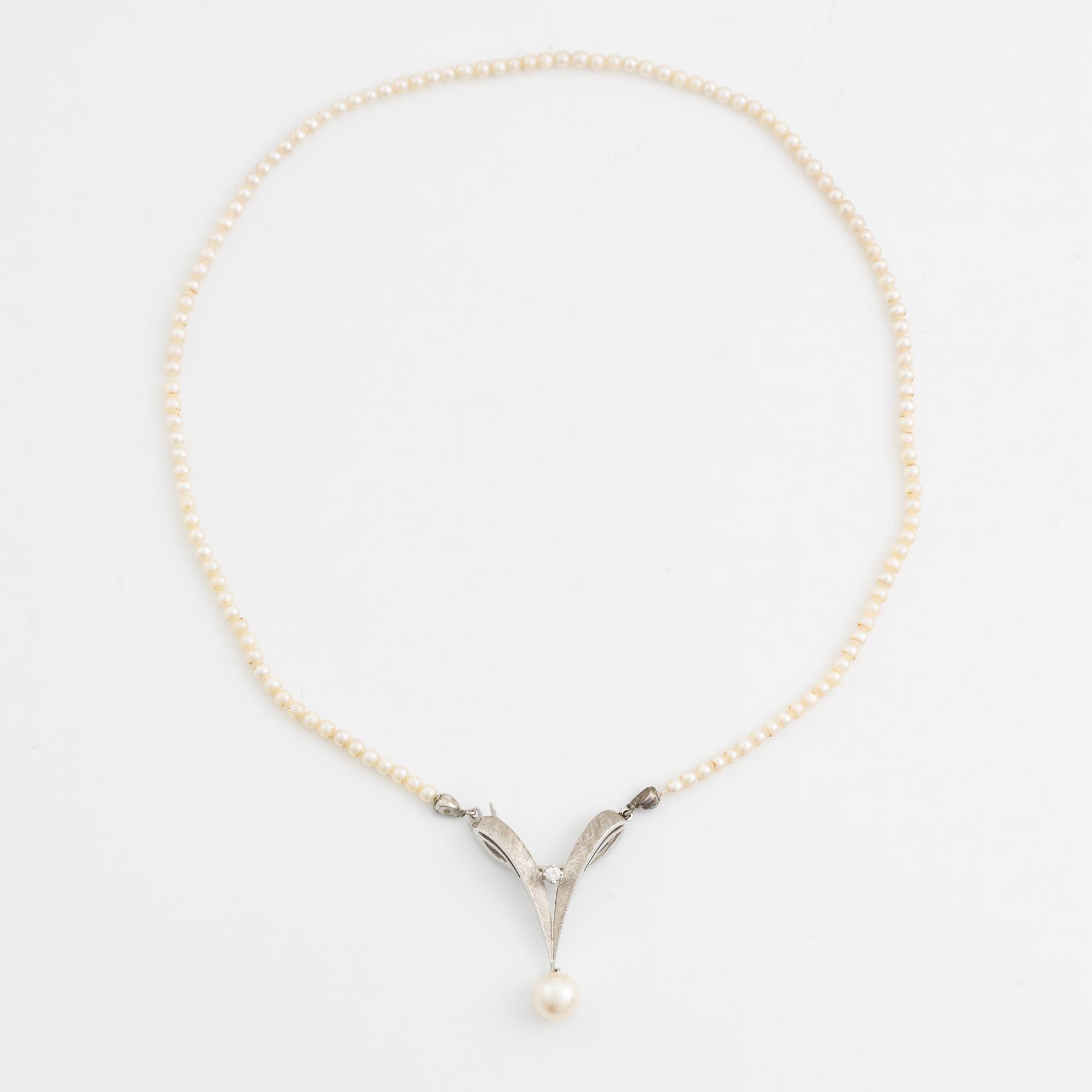 Necklace and earrings, a pair, cultured pearls, white gold, and brilliant- and octagon-cut diamonds.