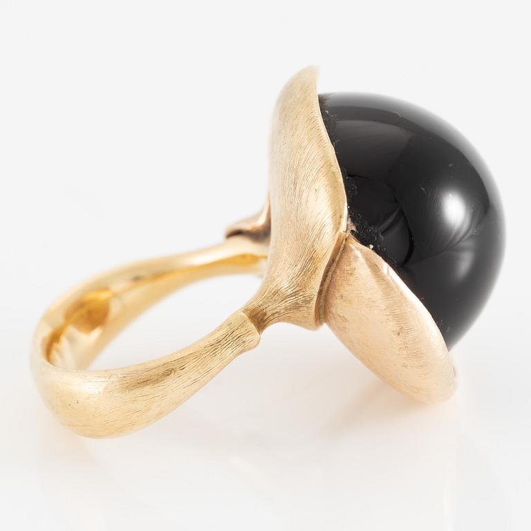 Ole Lynggaard, ring, large Lotus, 18K gold with cabochon-cut black stone probably onyx with brilliant-cut diamonds.