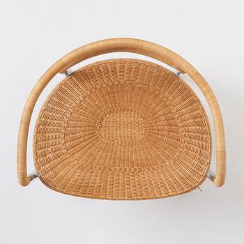 Poul Kjaerholm, a steel and rattan 'PK12' chair, E Kold Christensen, Denmark, early 1960s.