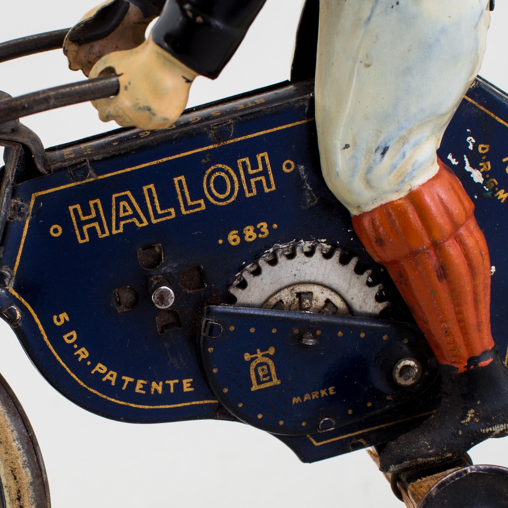 A partially hand painted tinplate Lehmann Halloh motorcycle, Germany. In production 1914-41.