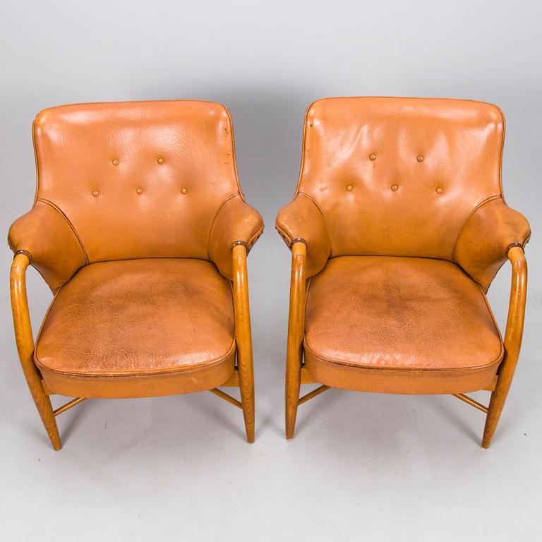 CARIN BRYGGMAN, A pair of 1950s armchairs for Kirjopuu, Finland.